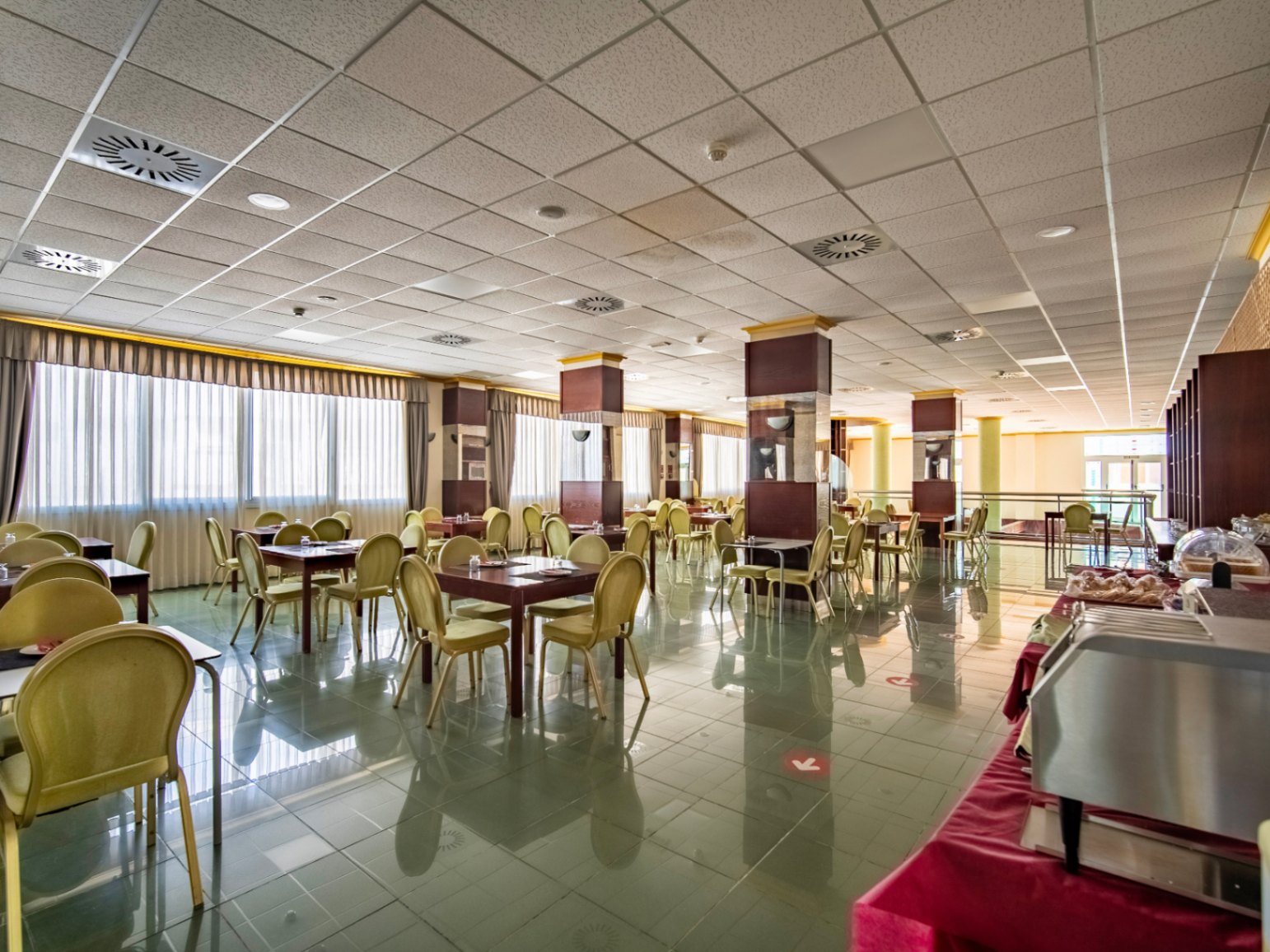 The building Hotel La Familia Gallo Rojo, located in El Campello, next to the beach.