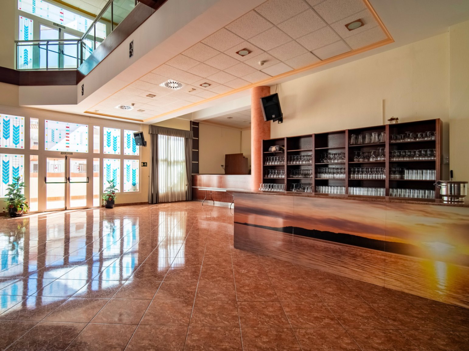 The building Hotel La Familia Gallo Rojo, located in El Campello, next to the beach.