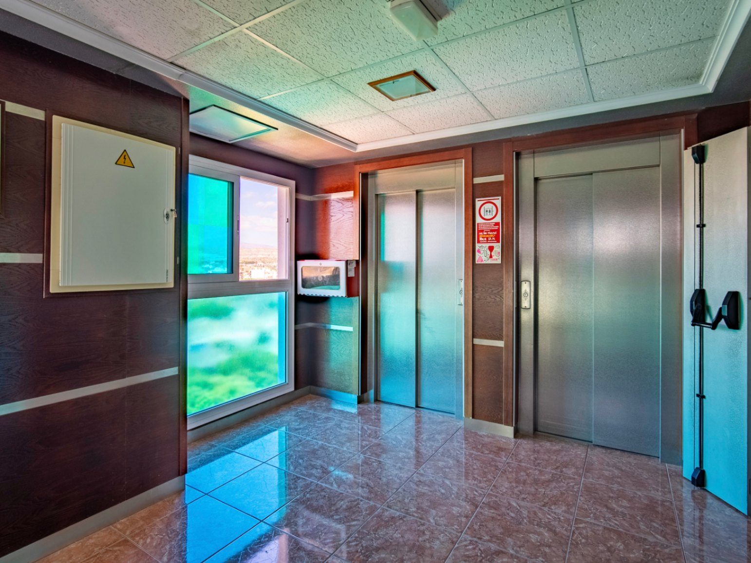 The building Hotel La Familia Gallo Rojo, located in El Campello, next to the beach.