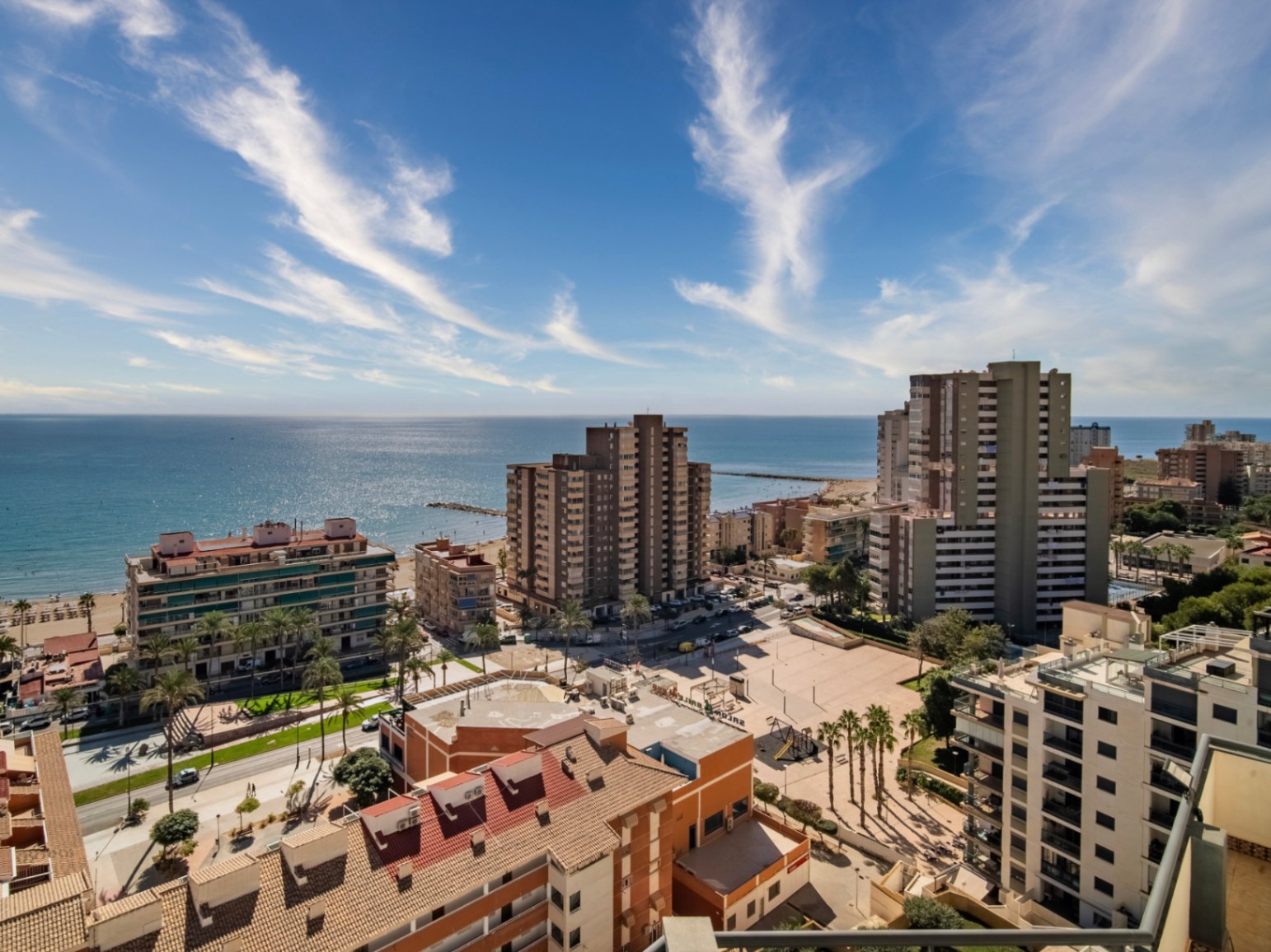 The building Hotel La Familia Gallo Rojo, located in El Campello, next to the beach.