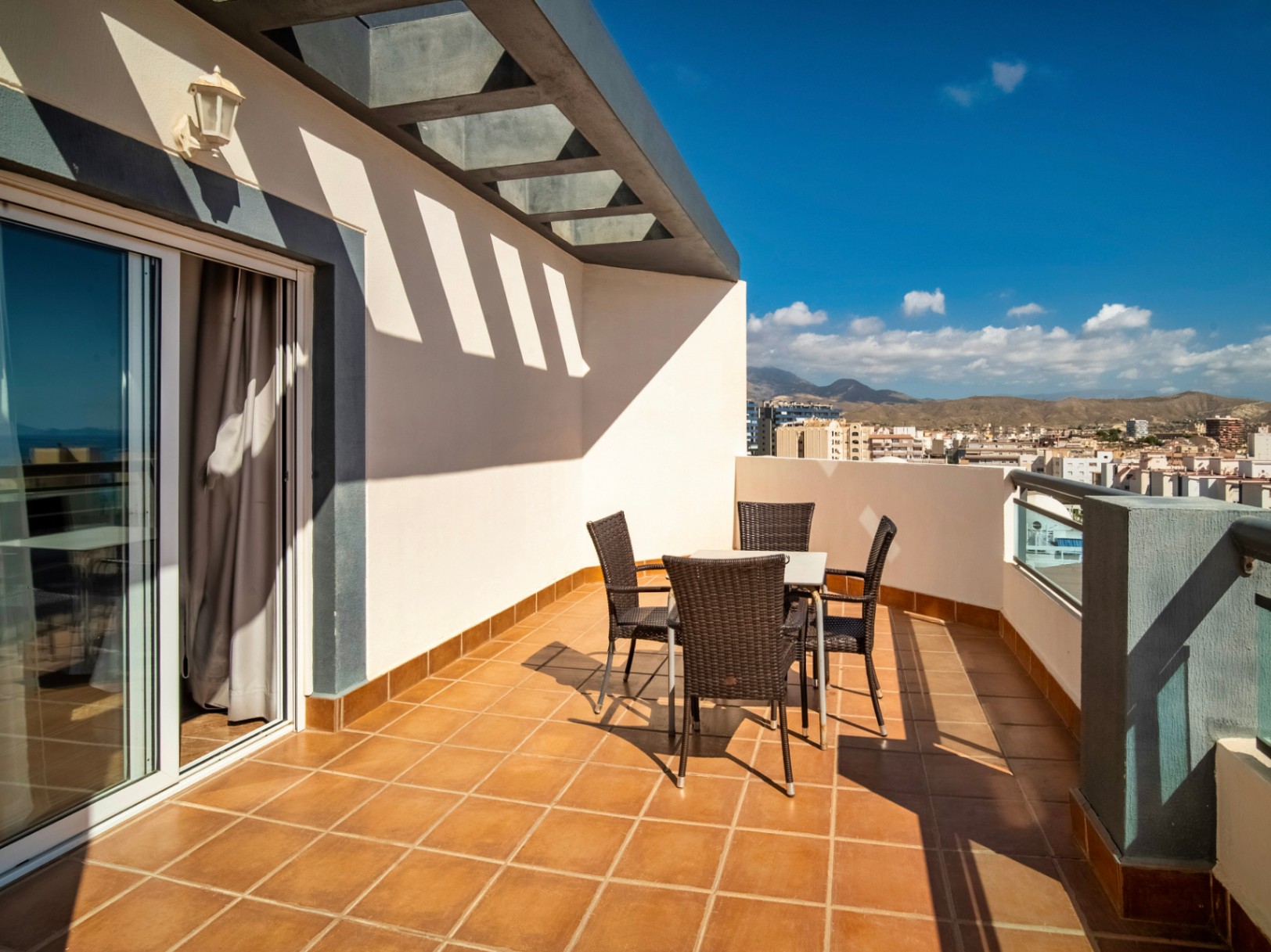 The building Hotel La Familia Gallo Rojo, located in El Campello, next to the beach.