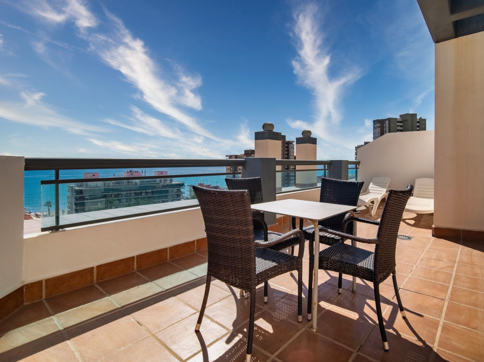 The building Hotel La Familia Gallo Rojo, located in El Campello, next to the beach.