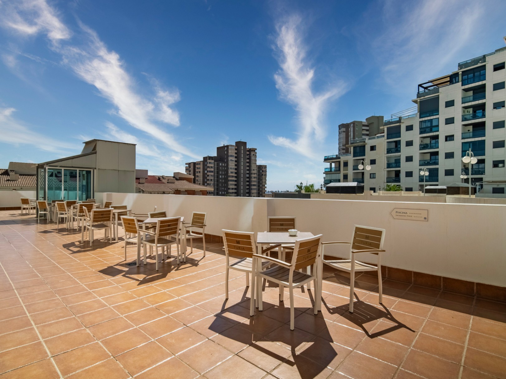 The building Hotel La Familia Gallo Rojo, located in El Campello, next to the beach.